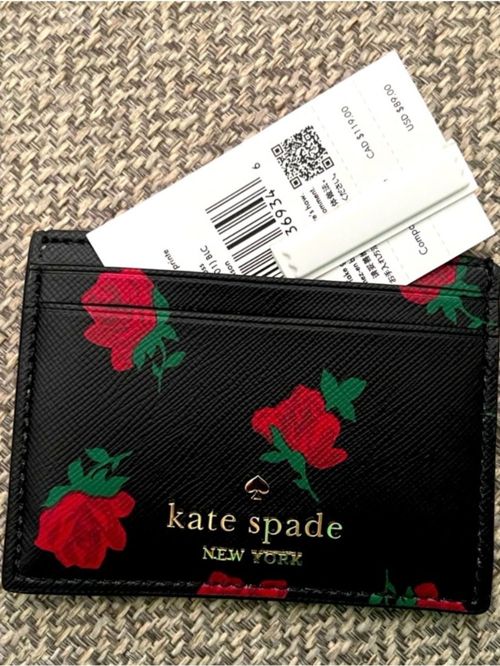 kate spade black cardholder with red and green floral print